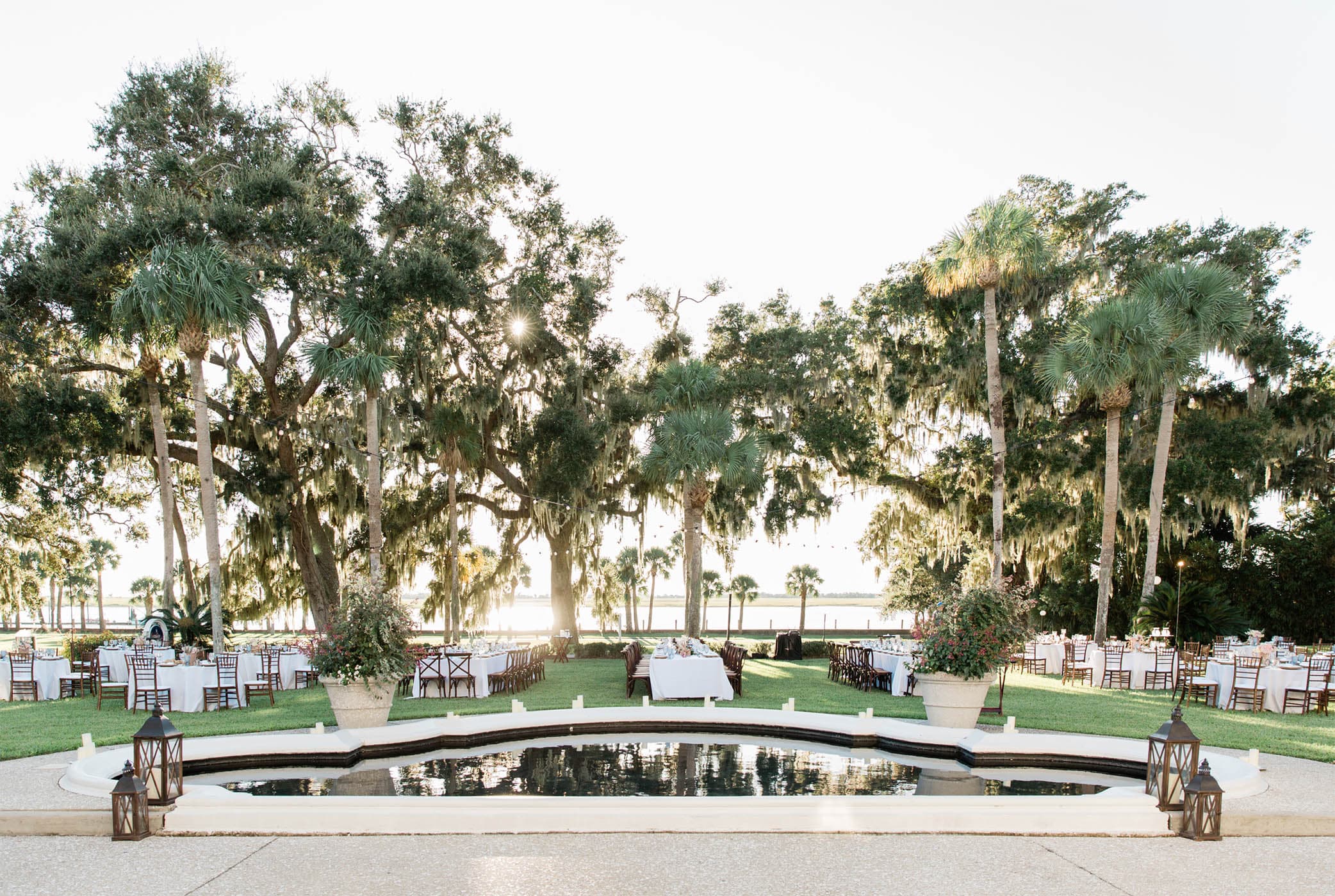 The outdoor wedding space set up for a wedding with a stunning view of the water