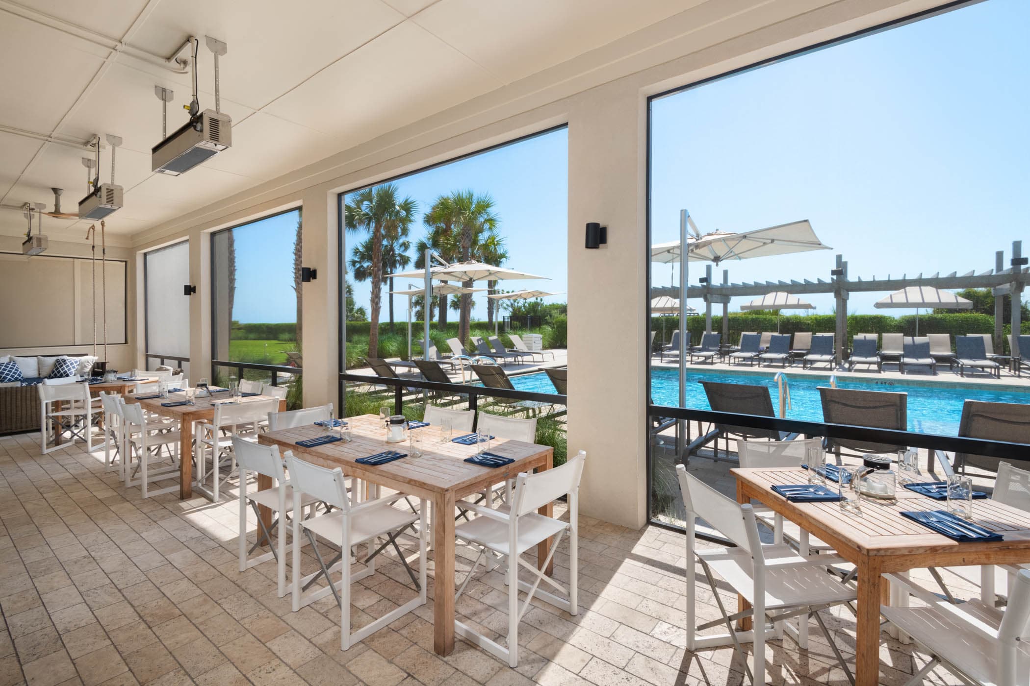 Inside the restaurant with a view of the pool