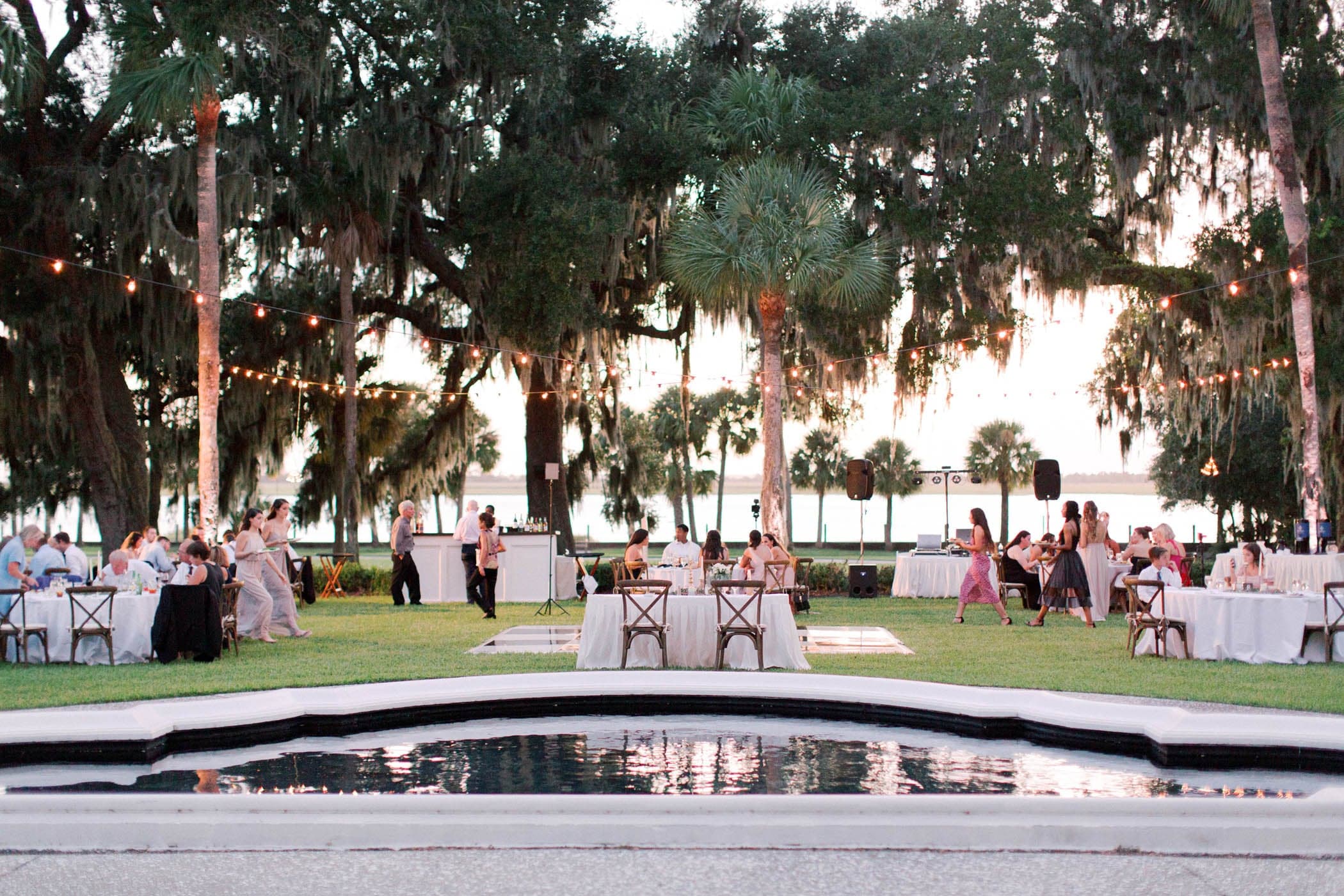 People celebrating an outdoor wedding at Jekyll