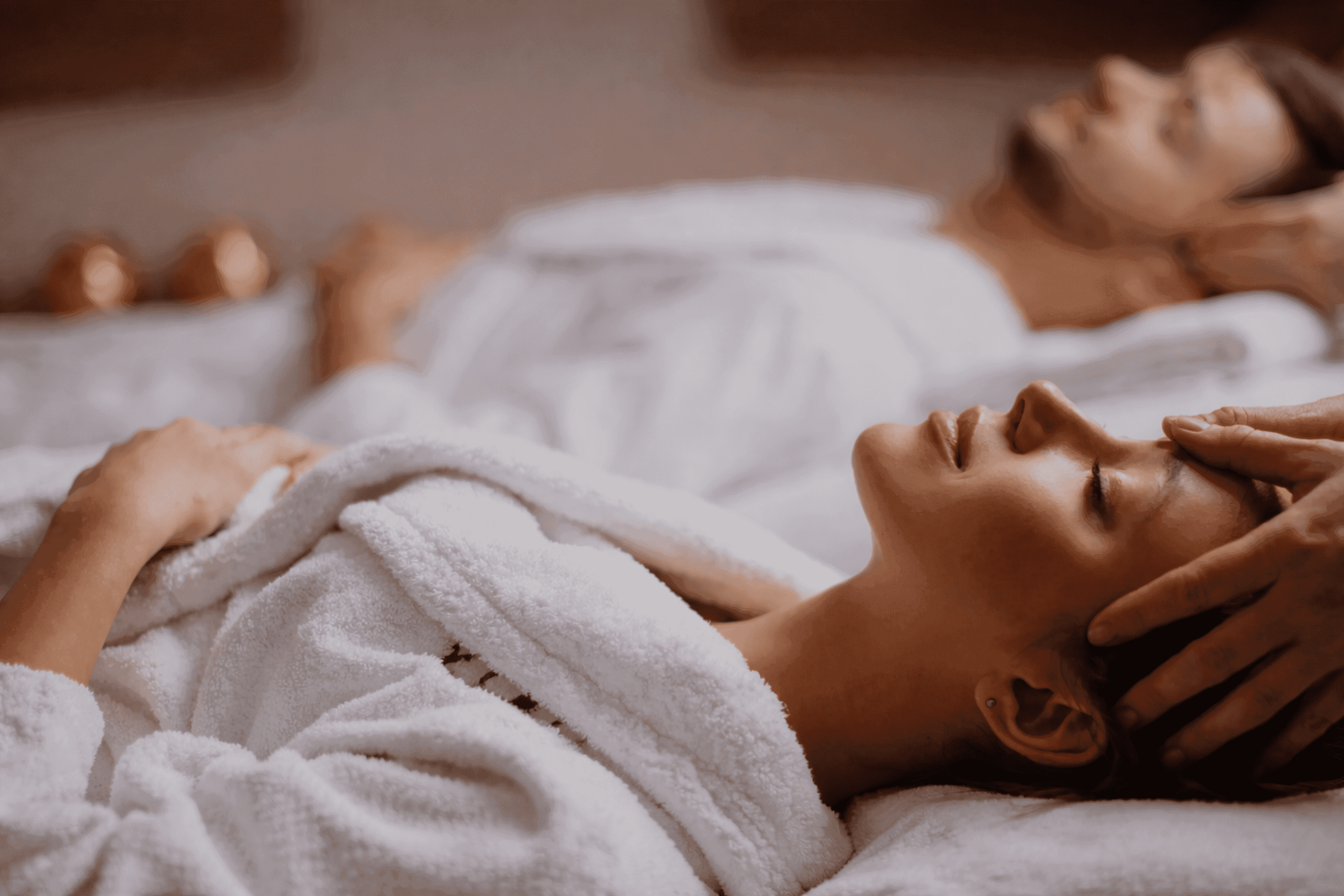 A man and woman getting massages