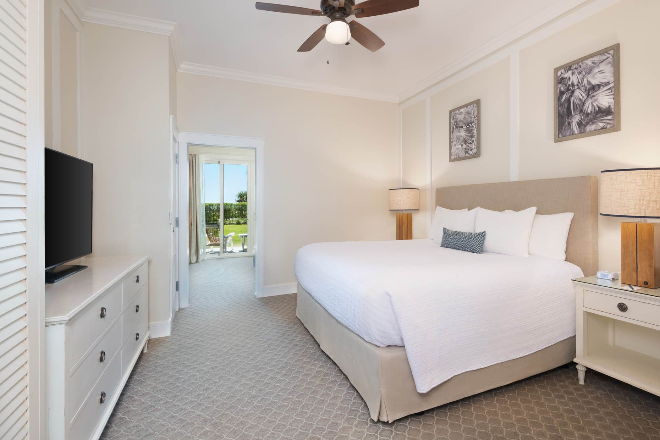 A king bed in a room at Jekyll Ocean Club