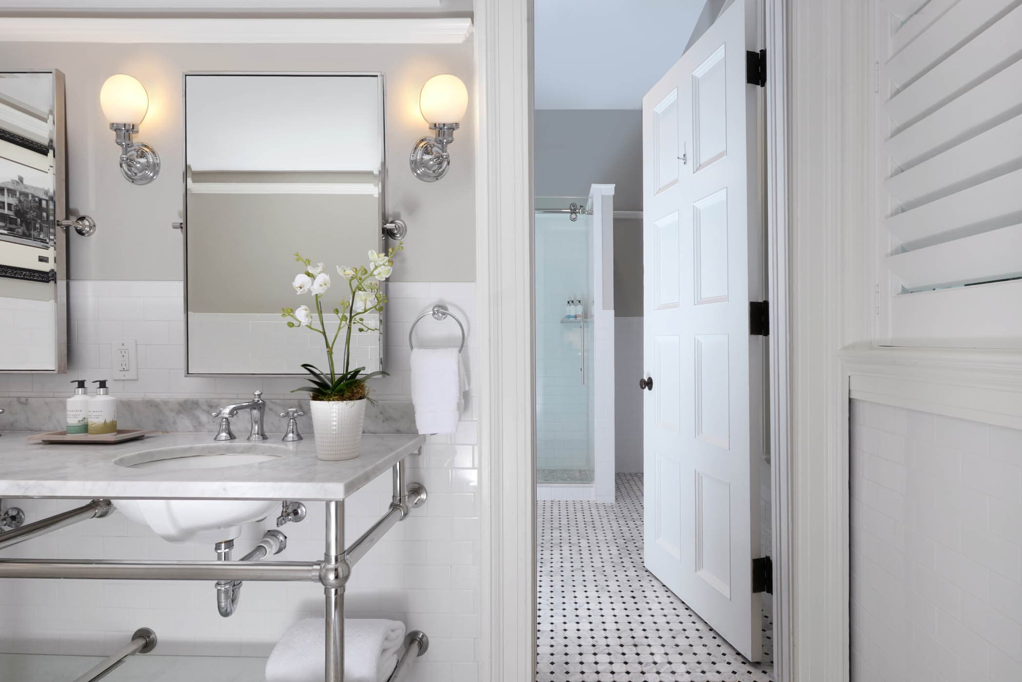 San Souci Bathroom with a double sink vanity and a separate showing room