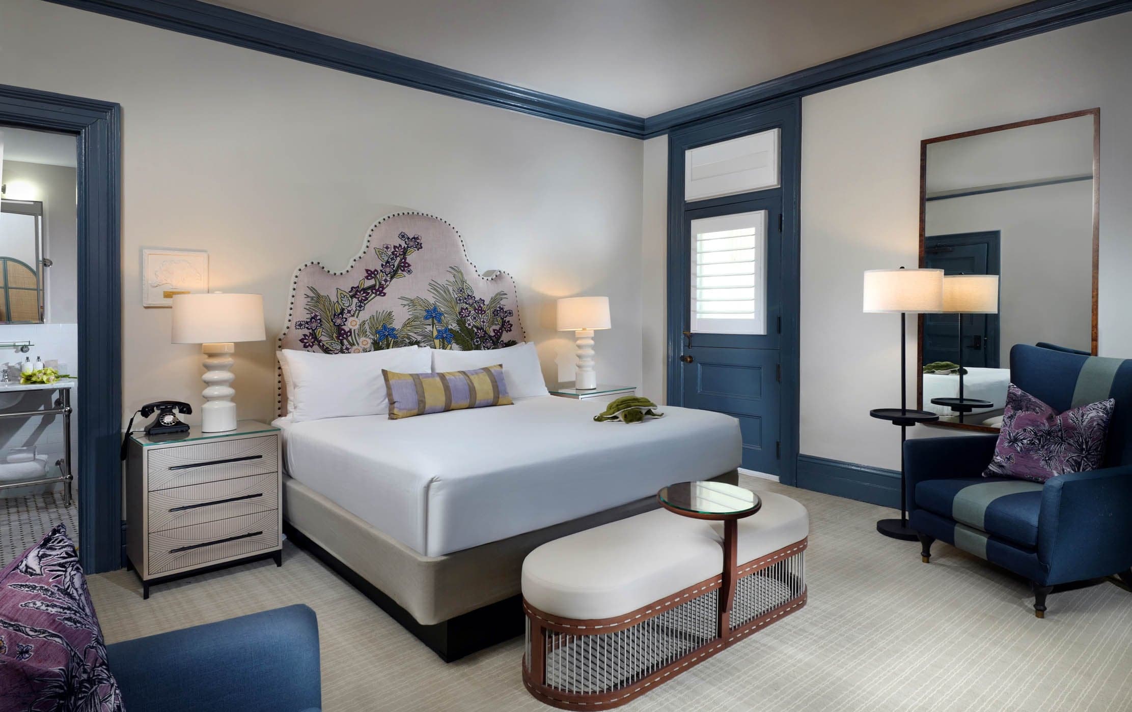 Deluxe King Clubhouse room with 2 lounge chair and access to a patio