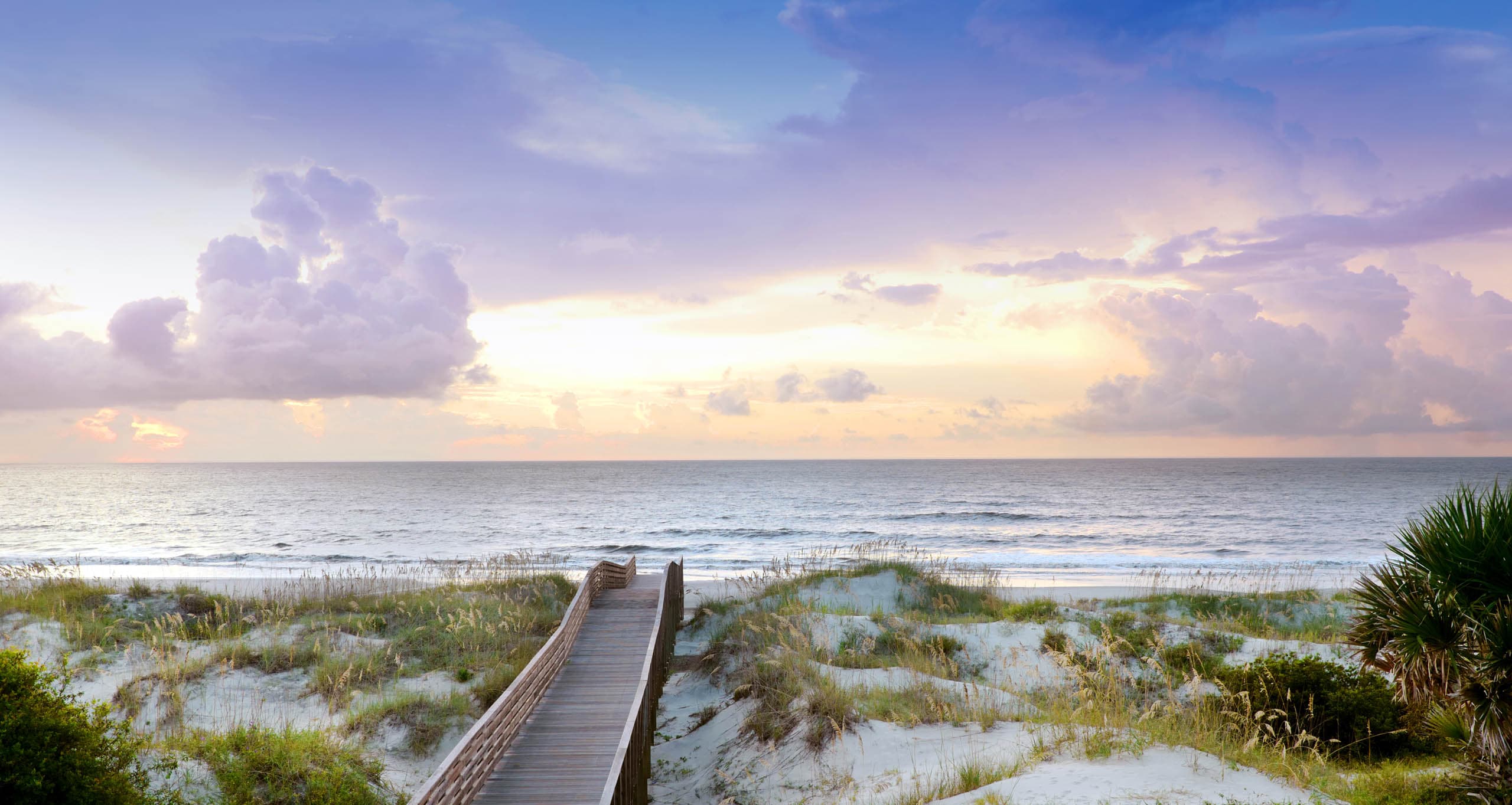 A boardwalk leading directly to a beach
