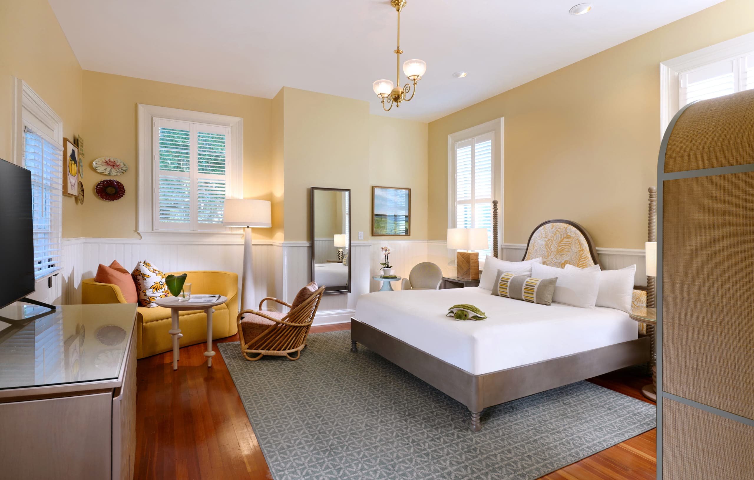 A king bed and living space in a Cherokee Deluxe King