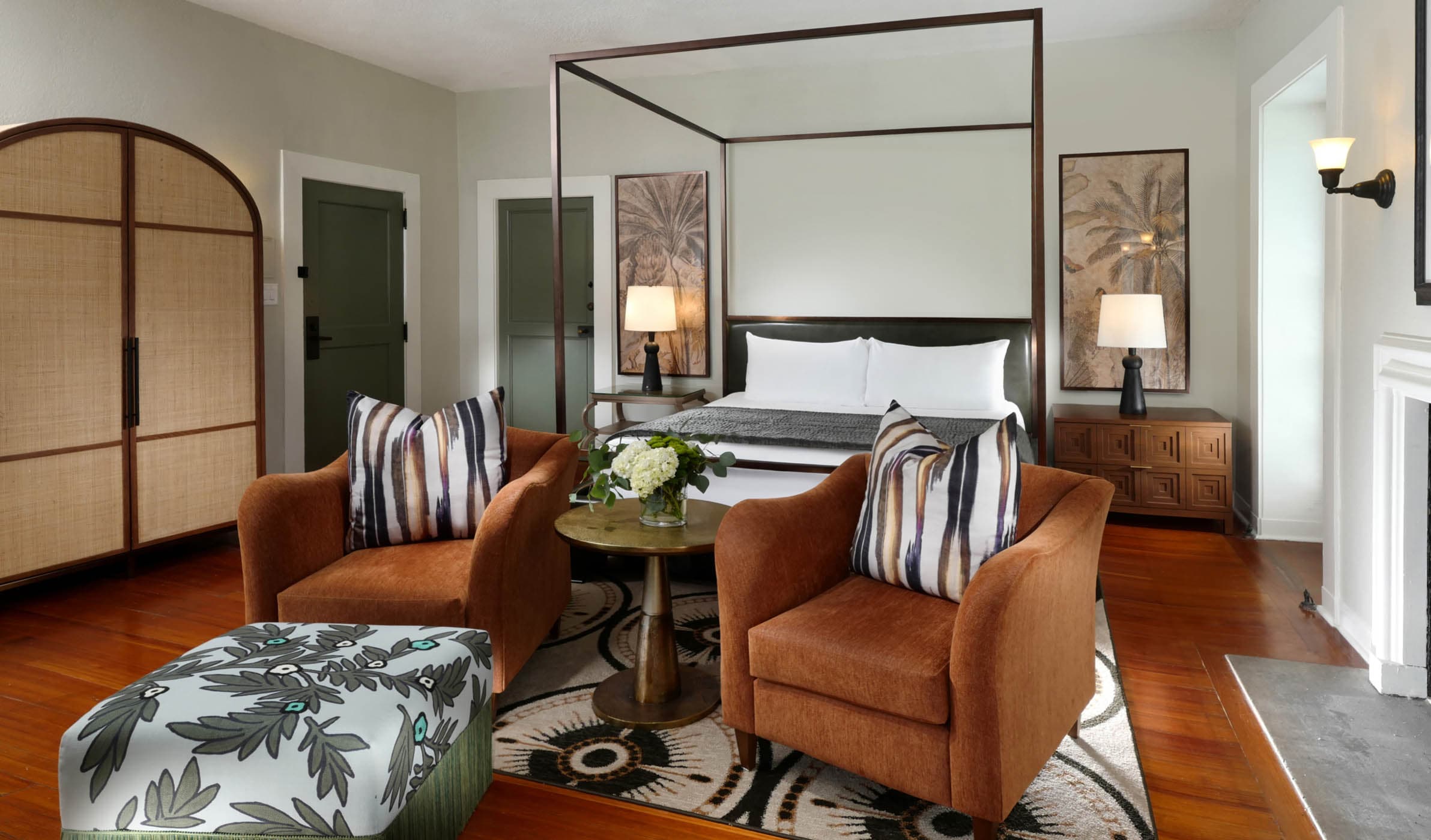 The living space and a king bed in a Crane Deluxe King