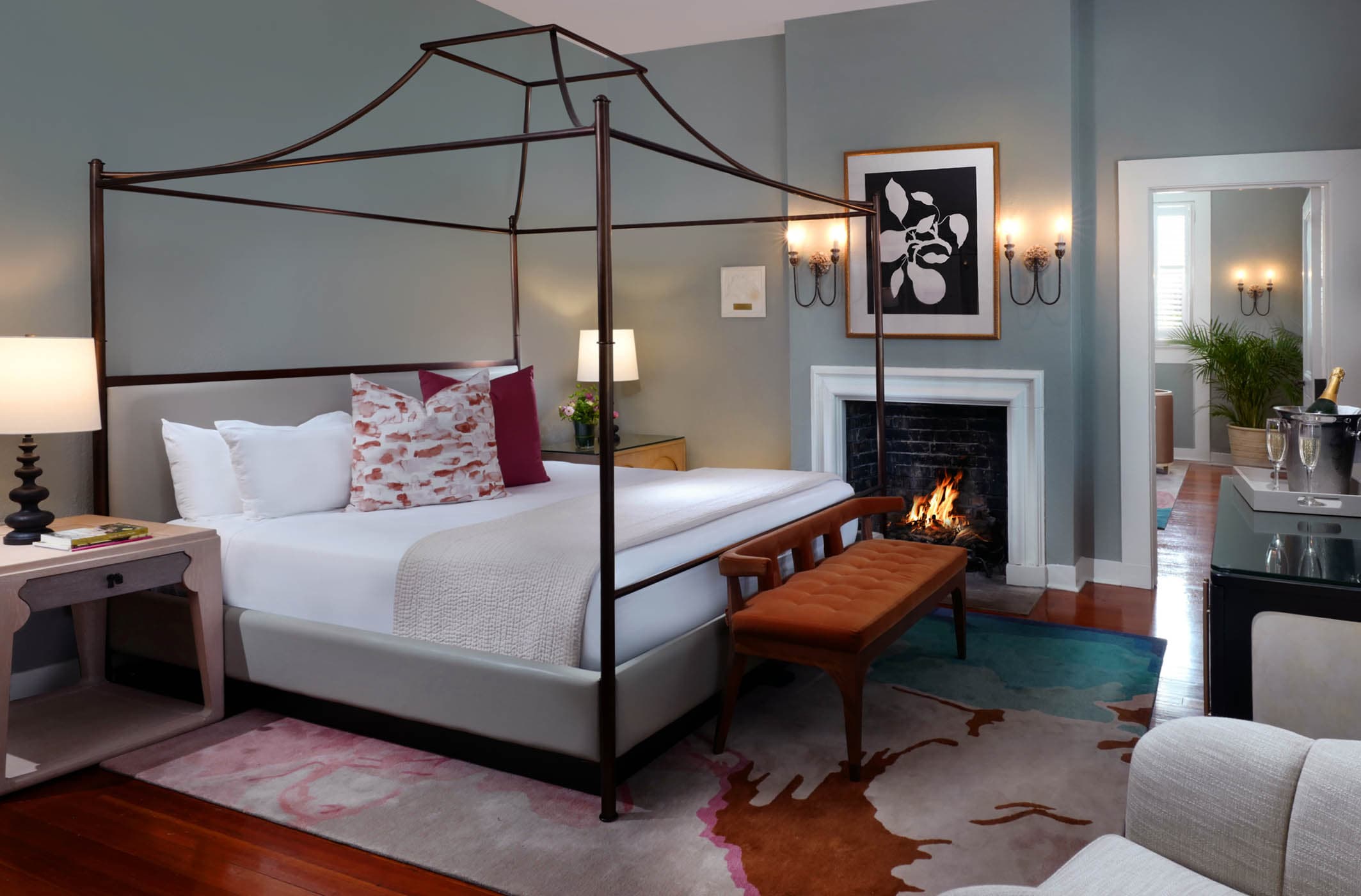 A king bed with a canopy in a Crane Duluxe King Suite