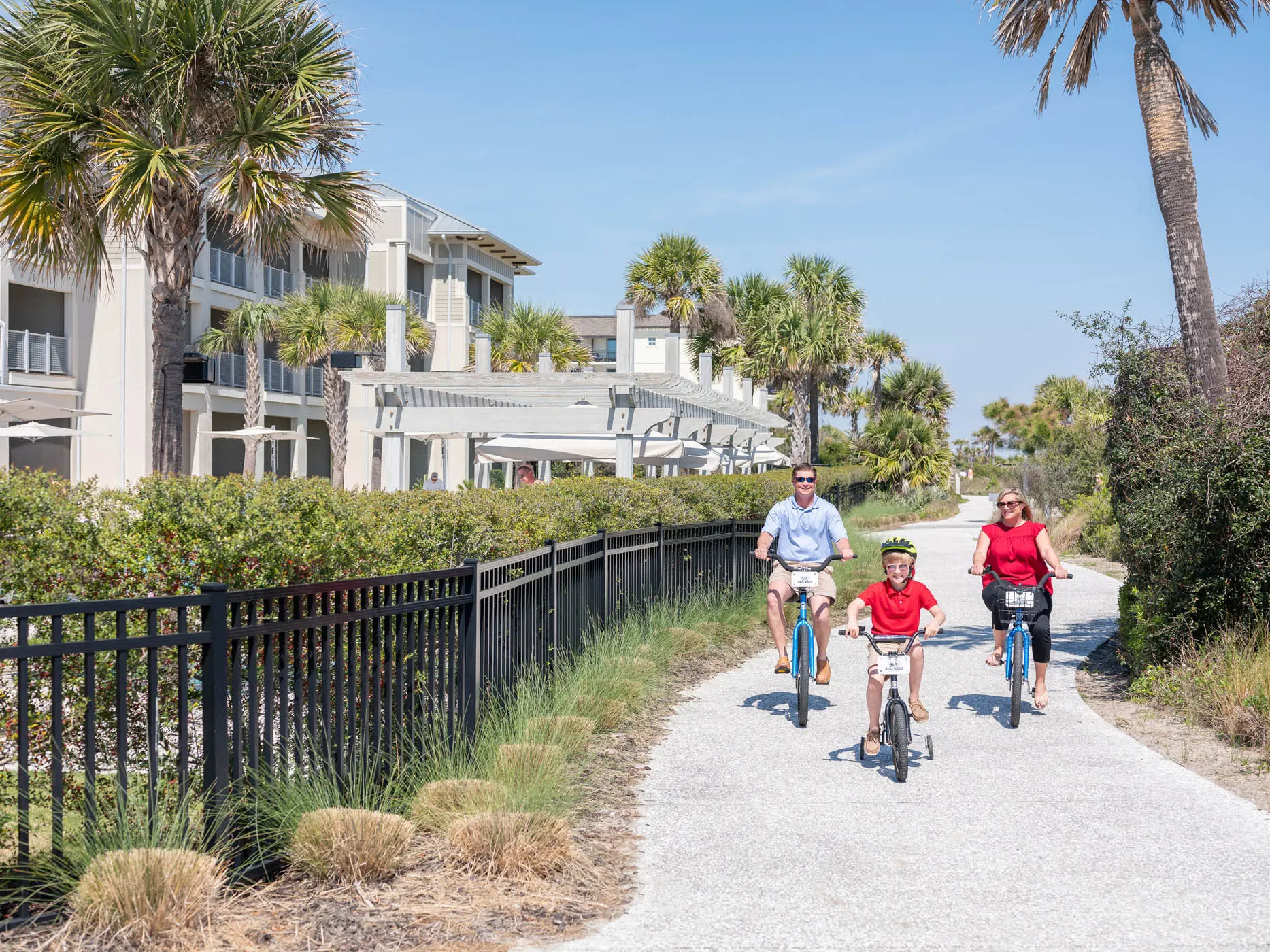 A family biking on a path