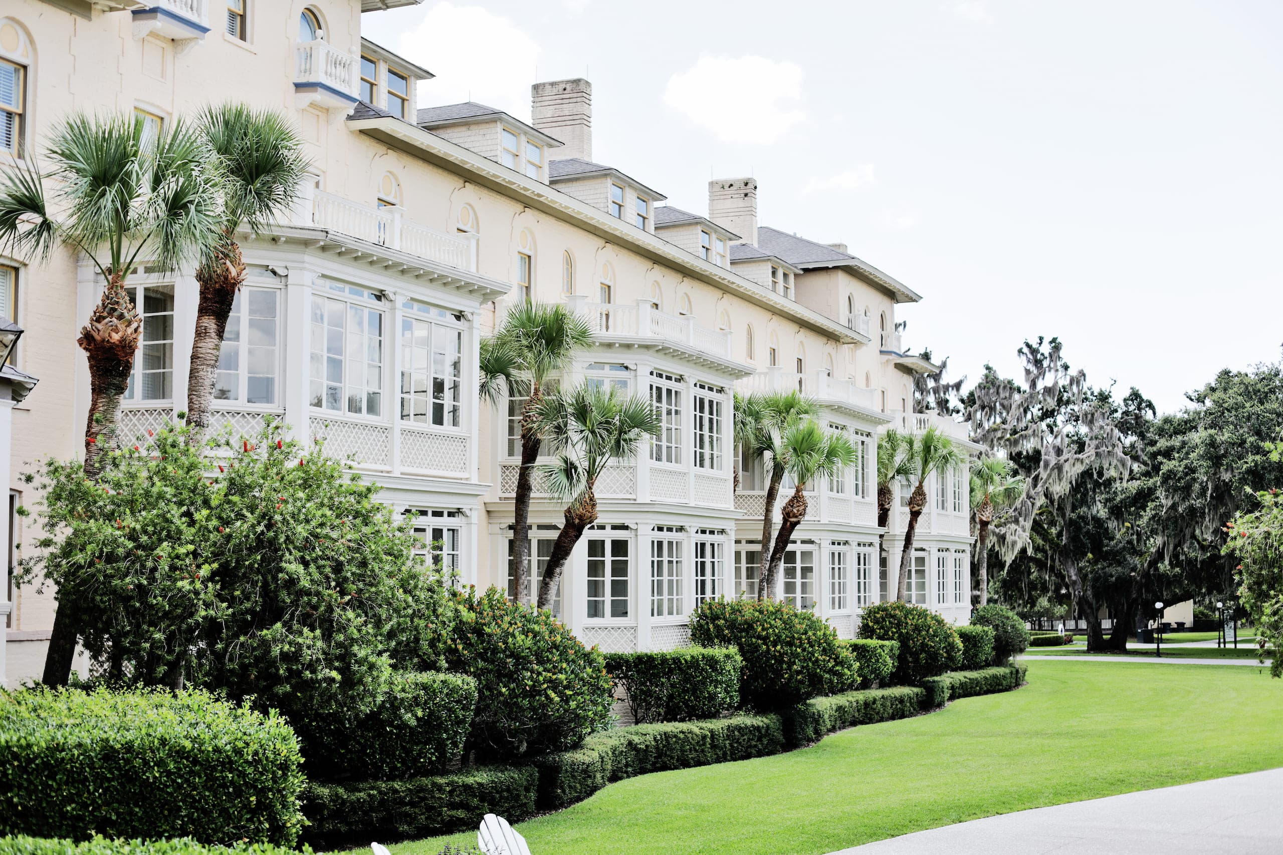 The outside of the resort with well manicured foliage