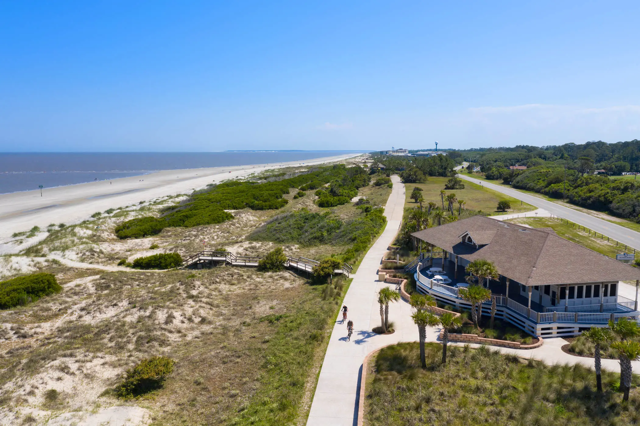 An aerial view of the beach and bike path