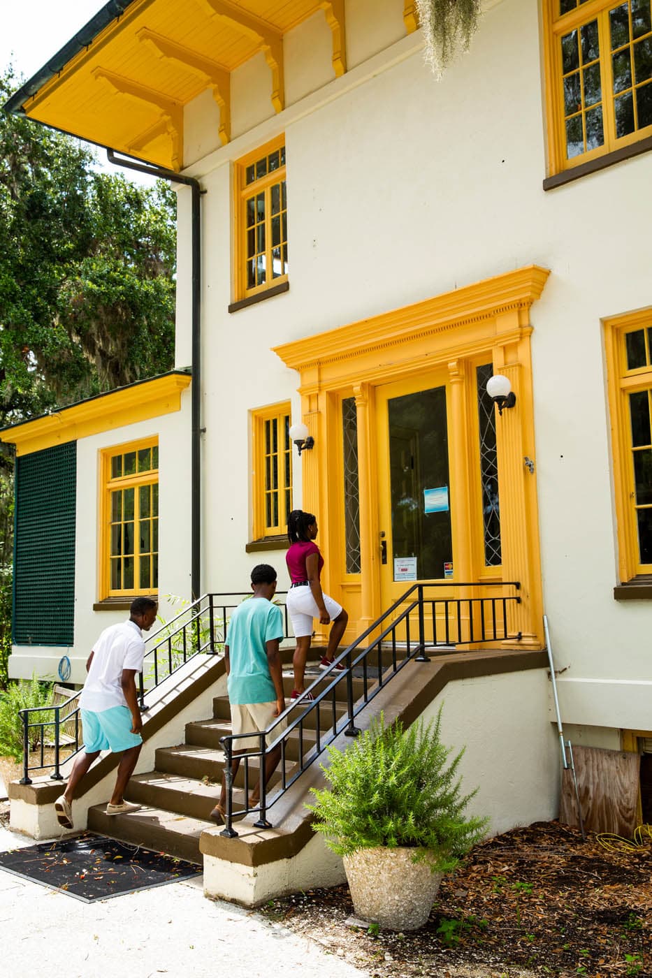 3 people entering Jekyll Arts Association