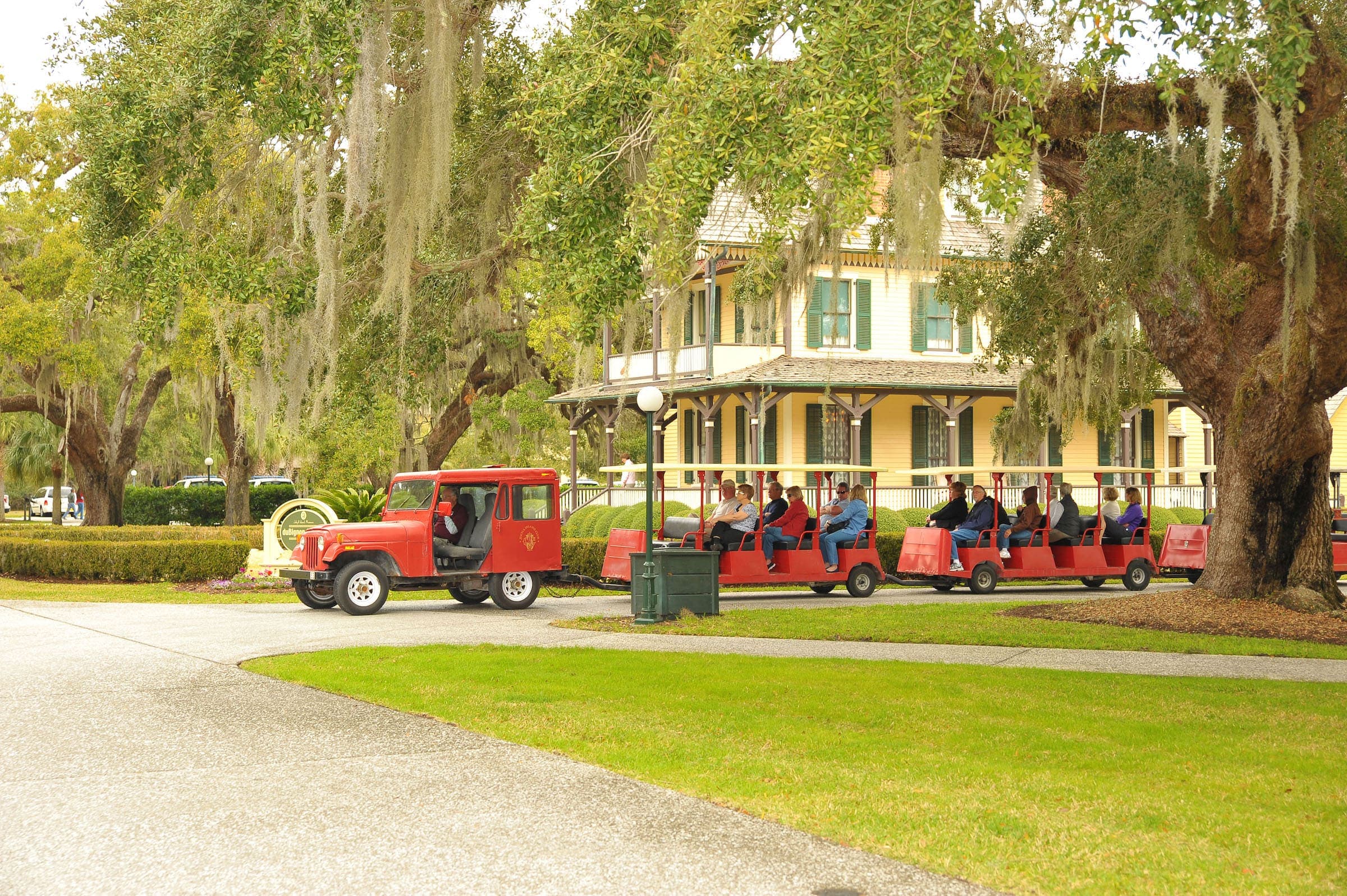 A tour with golf carts exploring the Jekyll Island Historic District