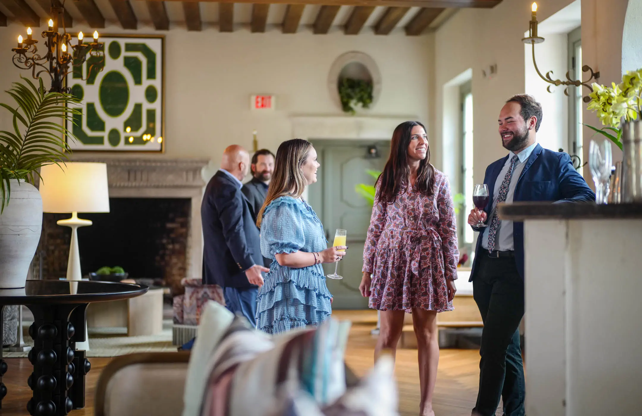 People socializing in the Sans Souci & Clubhouse
