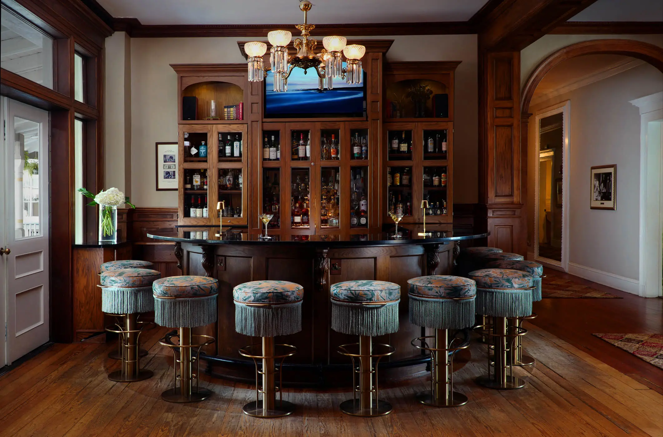 A gorgeous half circle bar inside The Alexander Bar