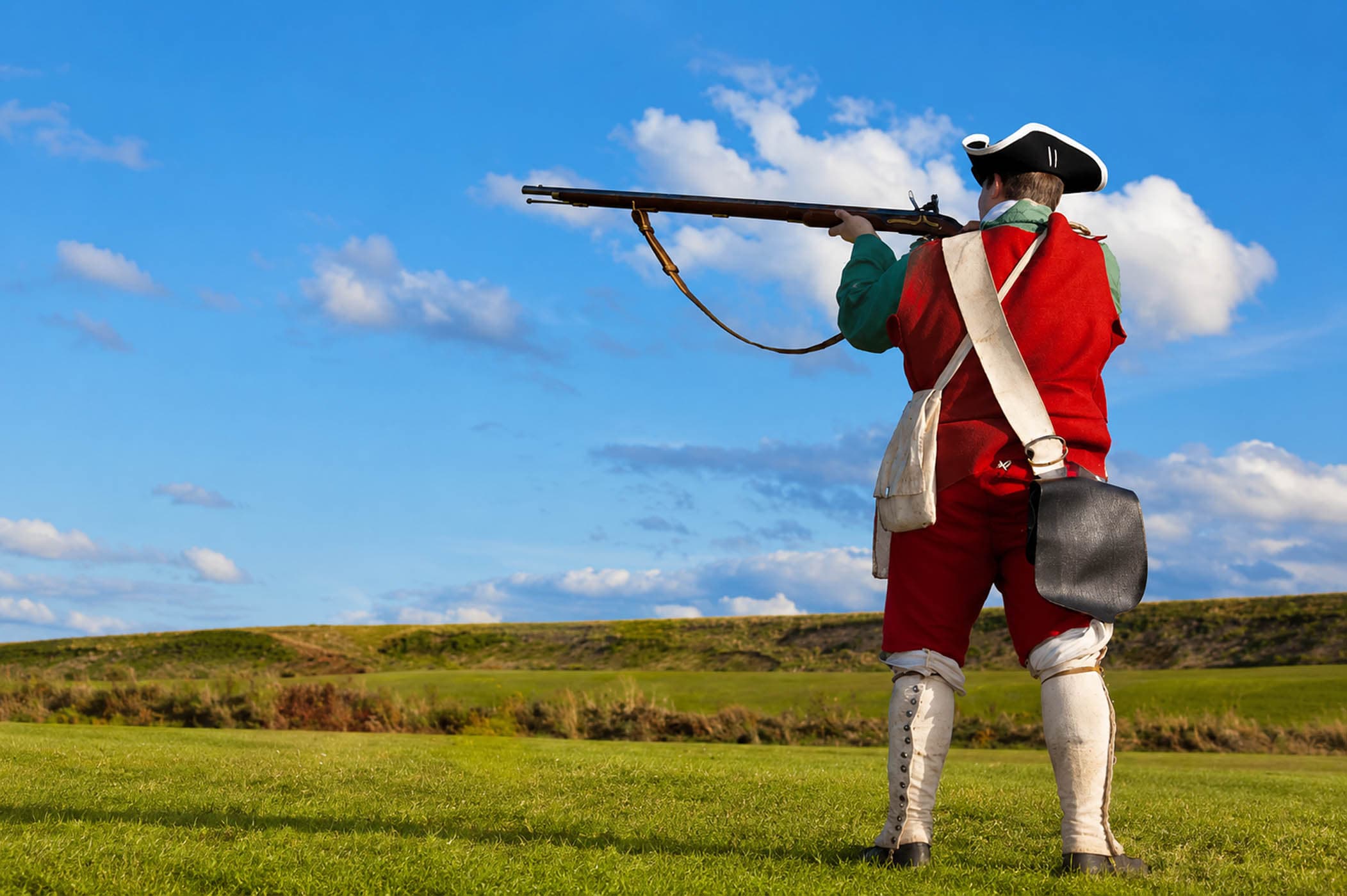 A man dressed in old fashioned time appropriate clothing at Fort King George