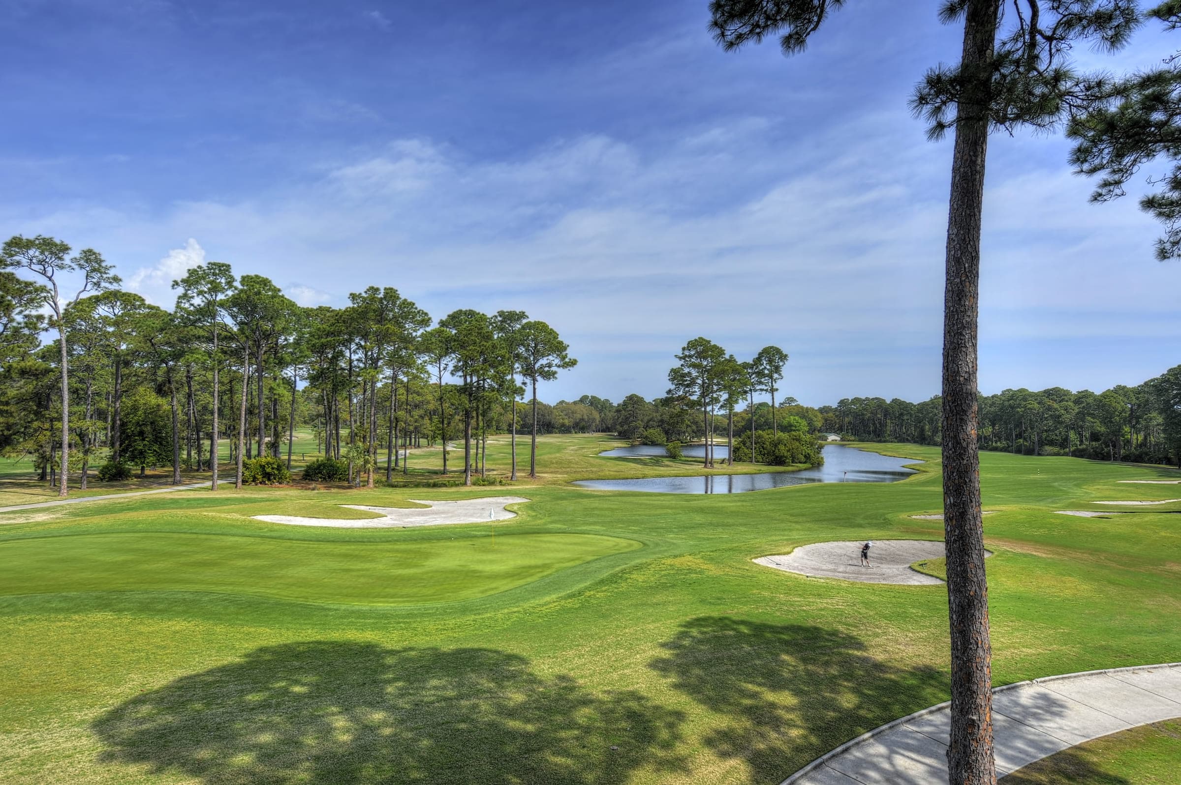 A person golfing from the sand trap at Jekyll Island Golf Club