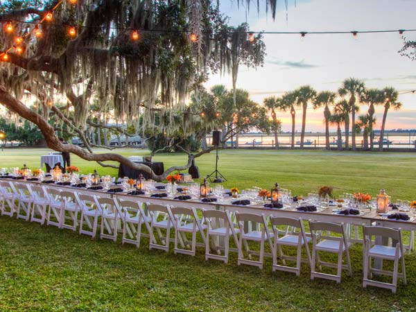 Large Event Table Outside At Sunset.