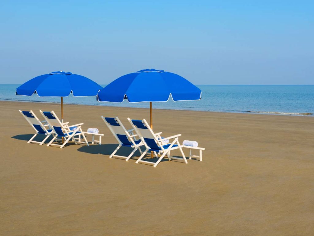Lounge Chairs On The Beach.