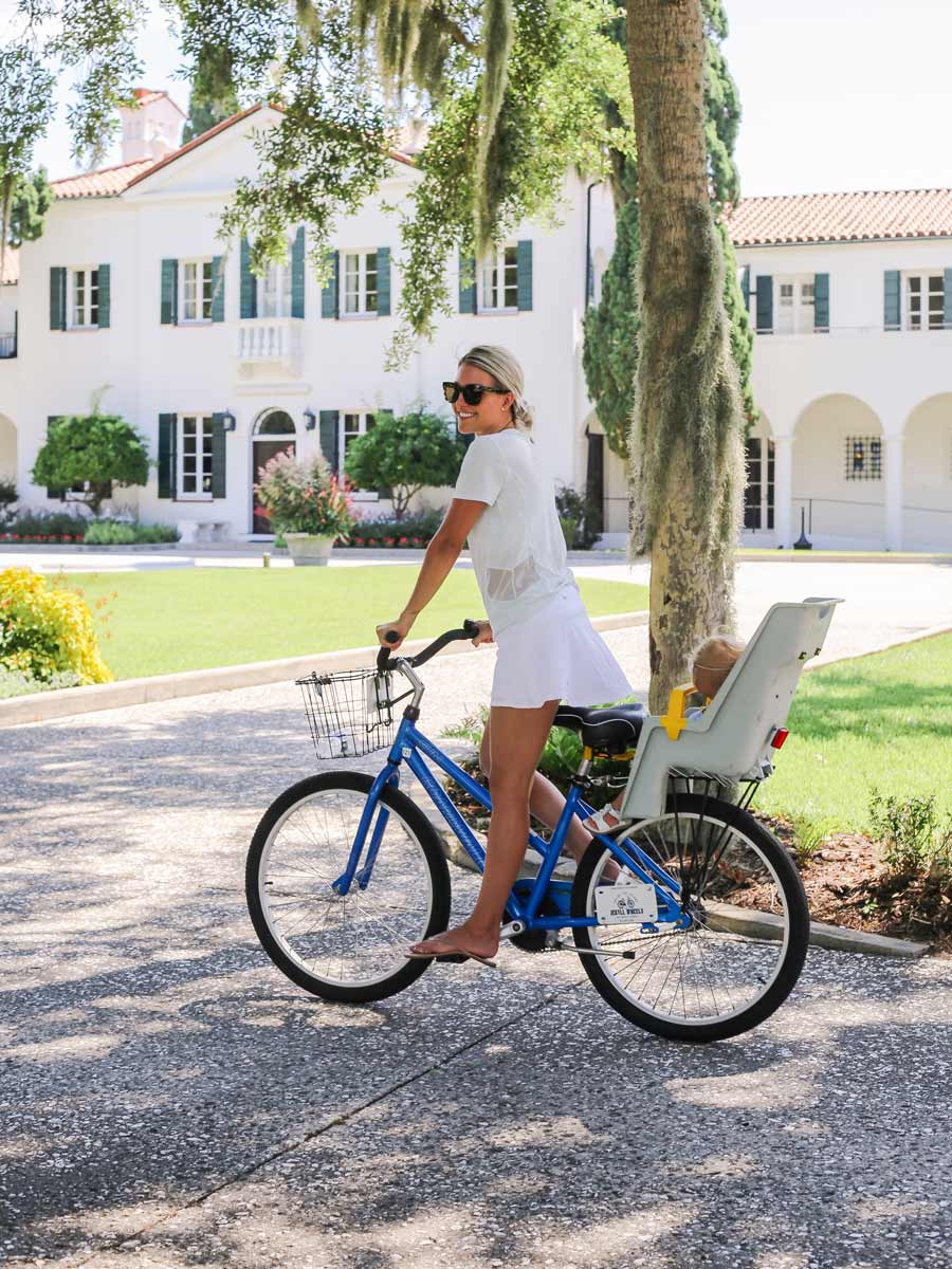 Lady With An Infant On A Bike.
