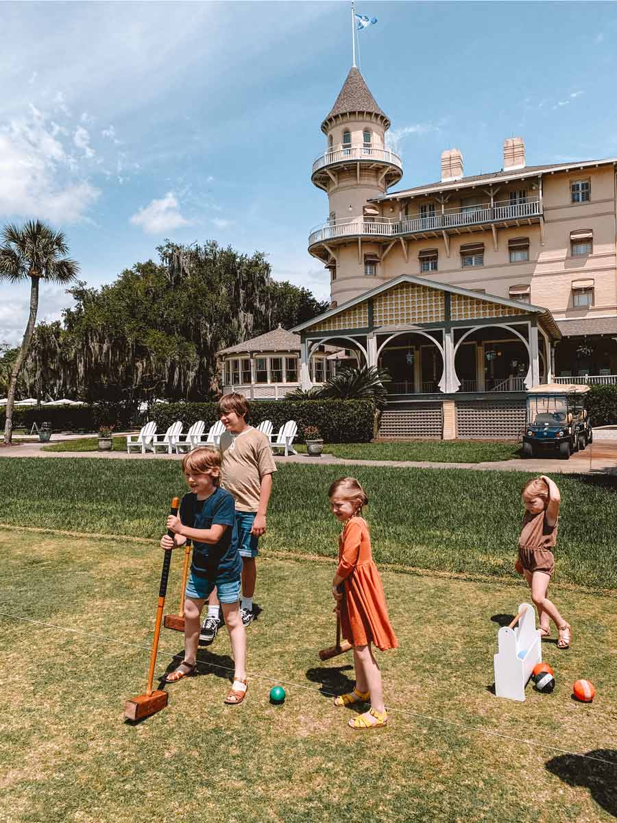 Kids Playing Croquet.