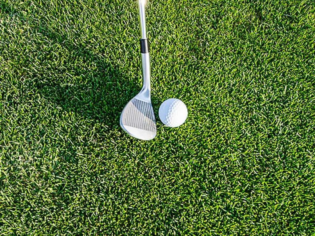 Golf Ball And Club.