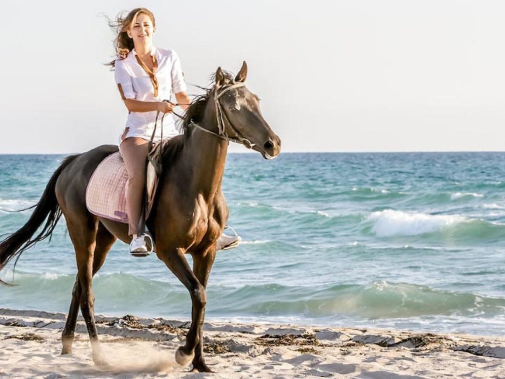 Horseback Riding On The Beach.