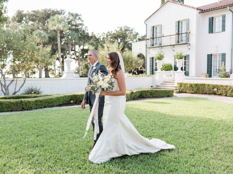 Carolyne Walking Down The Aisle With Her Dad.