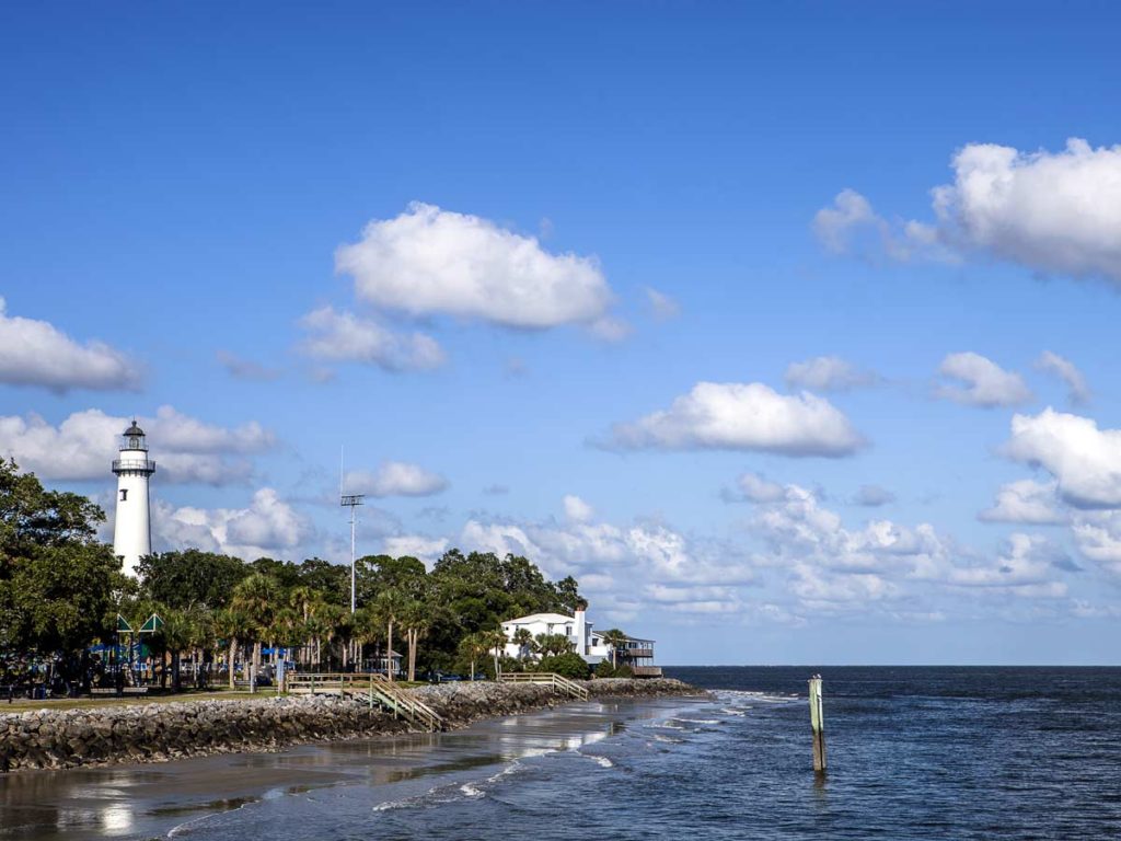 Lighthouse By The Beach.