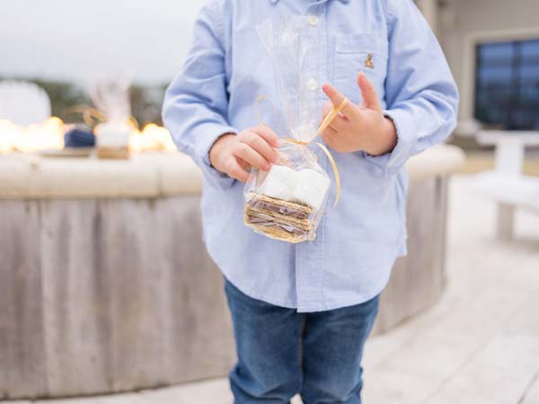 Kid With Smores Package.