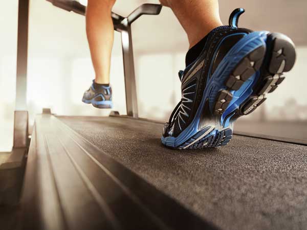 Running Shoes On A Treadmill.