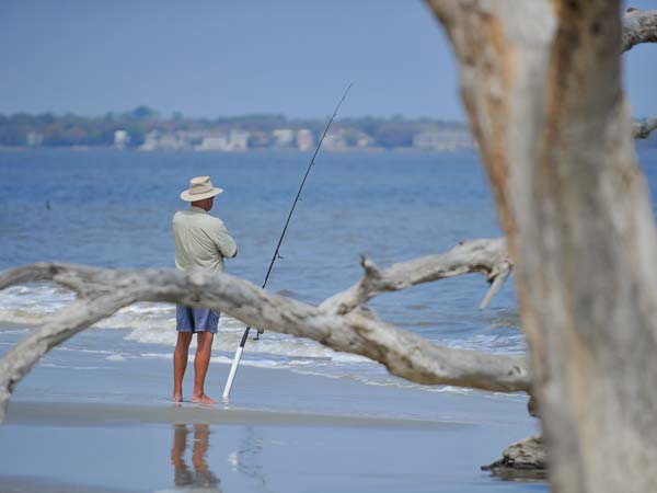 Fishing On The Beach.