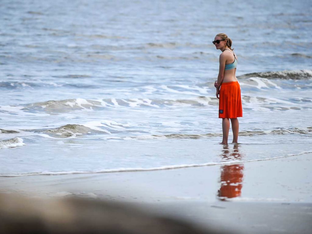 Lady Standing In The Ocean.