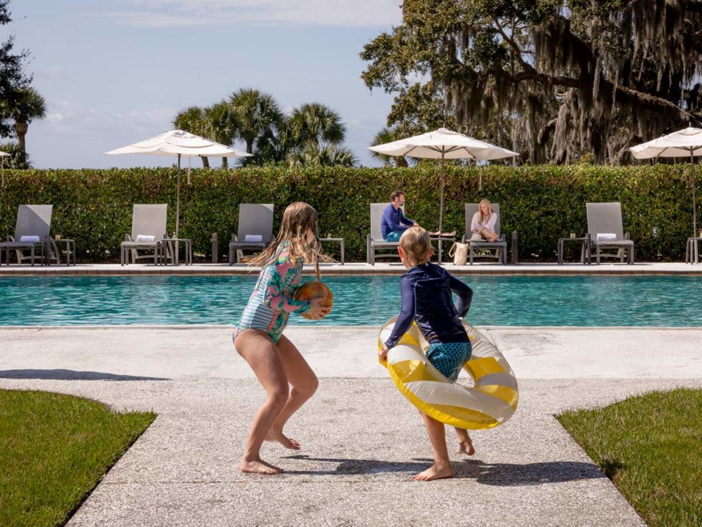 Kids Running Into The Pool.