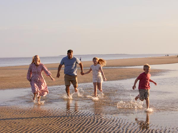 Family On The Beach.